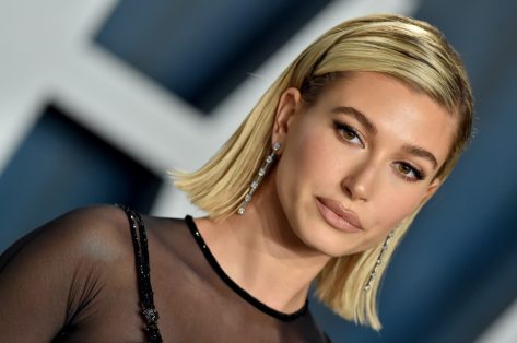 Hailey Bieber Flashes Flat Abs in Bikini for Superga