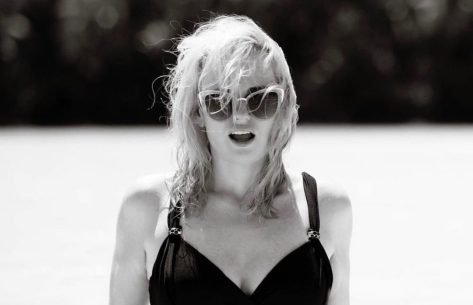 Rebel Wilson in Black Swimsuit Channels 1950s Pin Up Girl 