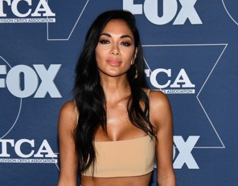 Nicole Scherzinger in Bathing Suit “Stays Calm” on Beach