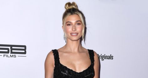 Hailey Bieber in Plunging Little Black Dress Celebrates “Vega$$$”