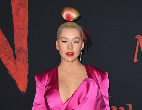 Christina Aguilera Lounges in Towel in New “Behind the Scenes” Photos