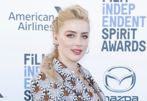 Amber Heard in Sports Bra Shares Photo From At-Home Workout