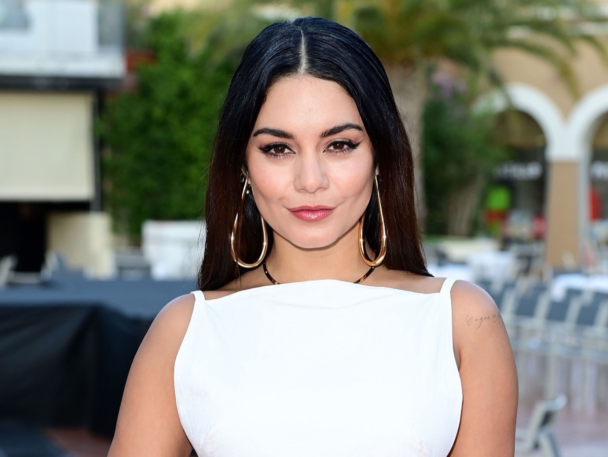 Vanessa Hudgens wears flower in hair on couple's trip to Antigua