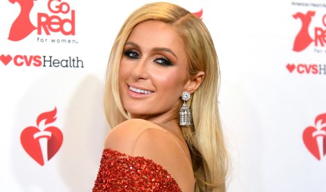 Paris Hilton in Bathing Suit Enjoys “Magical Kisses”