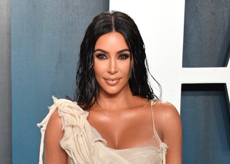 Kim Kardashian in Bathing Suit Studies for Her Law Exam