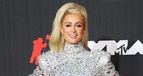 Paris Hilton in Bathing Suit is “Beach Barbie in Honeymoon Paradise”