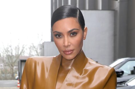 Kim Kardashian in Bathing Suit Poses Poolside