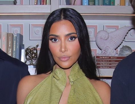 Kim Kardashian in Bathing Suit Shows Off Bling