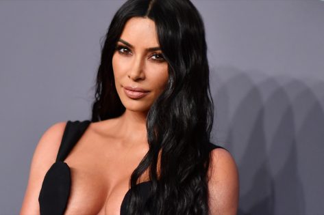 Kim Kardashian in Gym Pic Says “Chin Up or the Crown Slips”