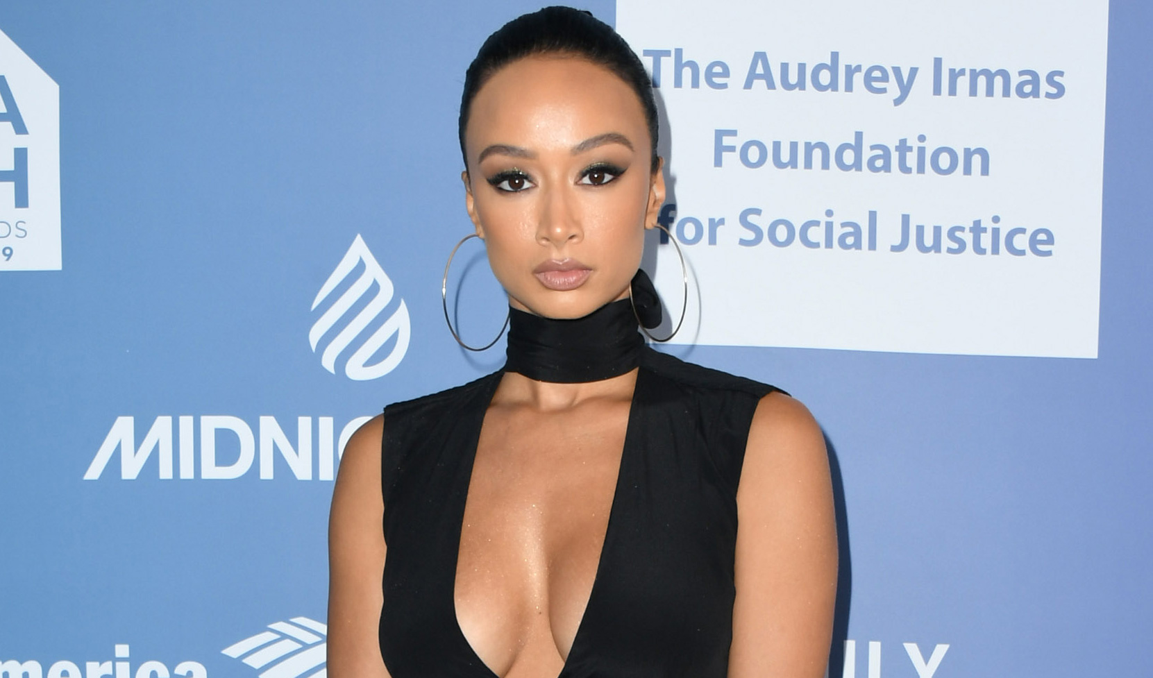 Draya Michele in Bathing Suit Says