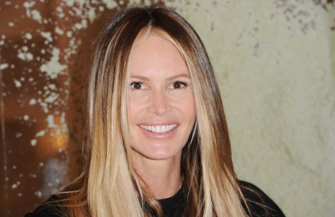 Elle Macpherson in Bathing Suit Does “Morning Meditations”