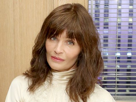 Helena Christensen in Bathing Suit Swims in Snowy “Beach”