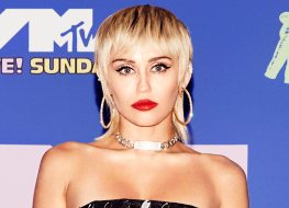 Miley Cyrus in Bathing Suit Shares Rare Photo from Beach