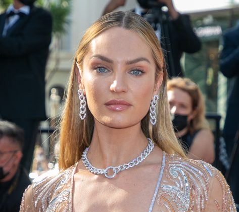 Candice Swanepoel in Bathing Suit Asks “Beauty or Beast?”
