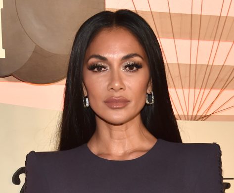Nicole Scherzinger in Bathing Suit Says “Seas the Day”