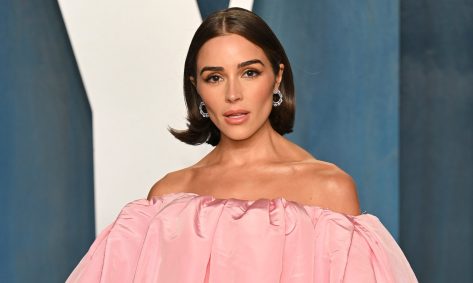 Olivia Culpo in Bathing Suit Says "Peace"