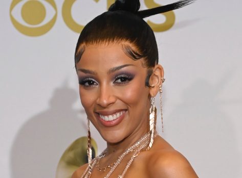 Doja Cat in Bathing Suit Says Sun’s Out, Gun’s Out