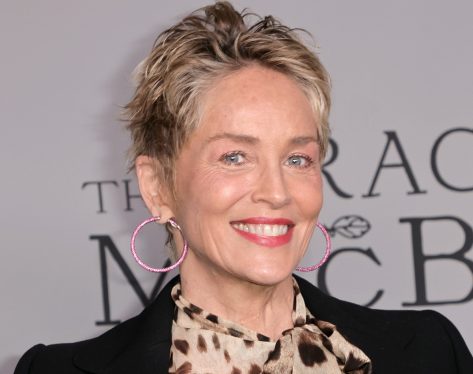 Sharon Stone in Bathing Suit is "Reporting From Cannes"