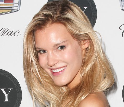Joy Corrigan in Bathing Suit is “Living in Paradise”