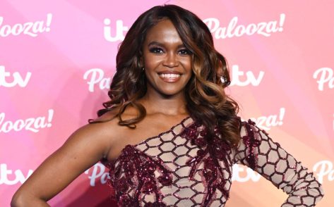 Oti Mabuse in Bathing Suit is “Cliff Jumping in Greece”