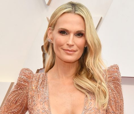 Molly Sims in Bathing Suit “Ain’t Going Nowhere”