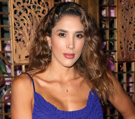 Daniela Ospina in Bathing Suit Says “The Sun Always Rises”