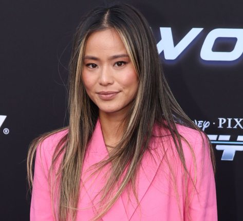 Jamie Chung in Bathing Suit “Touched Down in Aruba”