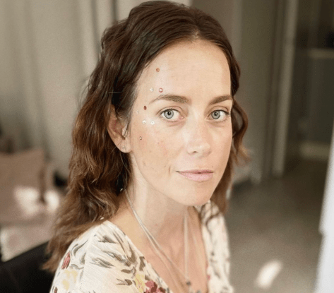 Iina Kuustonen in Bathing Suit Has a “Spray Tan and Lipstick”