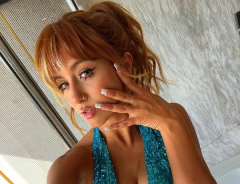 Flor Vigna in Bathing Suit Says “Give it a Good Vibe”