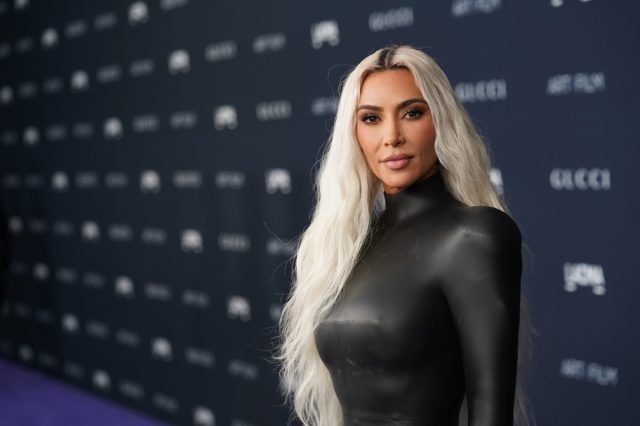 Kim Kardashian in String Bikini Shares Resting Beach Face — Celebwell