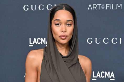 Laura Harrier in Bathing Suit Shares a “Rum Punch”