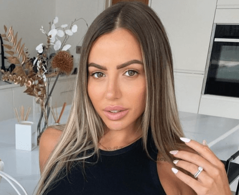 Holly Hagan in Bathing Suit is “Half Way”