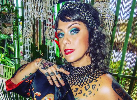 Danielle Colby in Bathing Suit is “Refreshed”