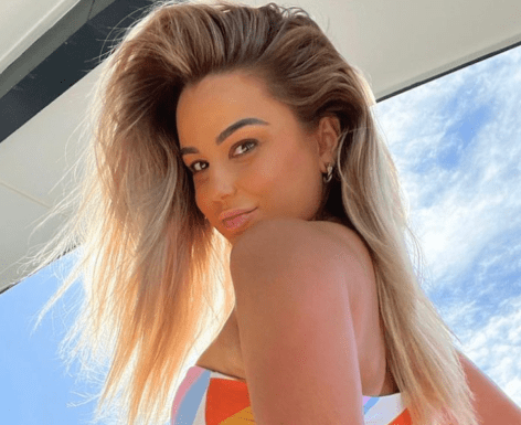 Karina Irby in Bathing Suit Says “Be Your Own Motivation”