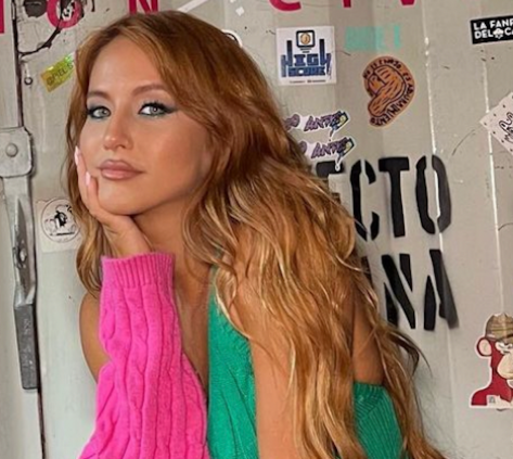 Flor Vigna in Bathing Suit is on the Water