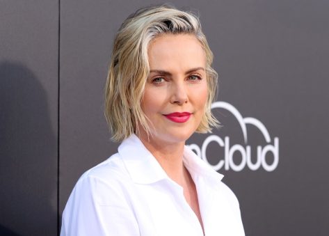 Charlize Theron in Bathing Suit Says “Don’t Be Shy”