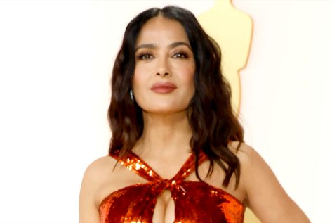 Salma Hayek in Bathing Suit “Jumps Into the Ocean”