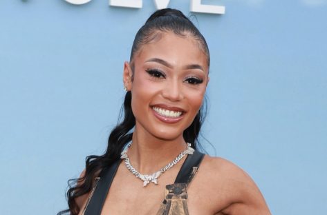 Coi Leray in Bathing Suit Shows “Dope Art”