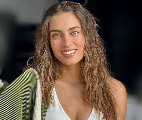 Laura Archbold in Bathing Suit Enjoys “Beach Bliss”