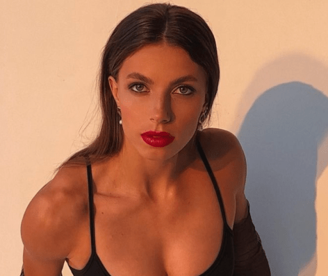 Maryna Bekh-Romanchuk in Bathing Suit Asks “Red is My Color?”