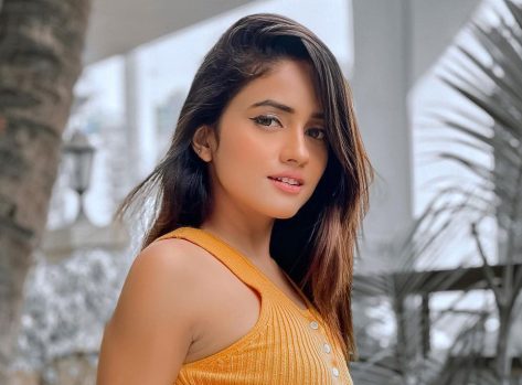 Nisha Guragain in Bathing Suit Says “Cool Me Down”