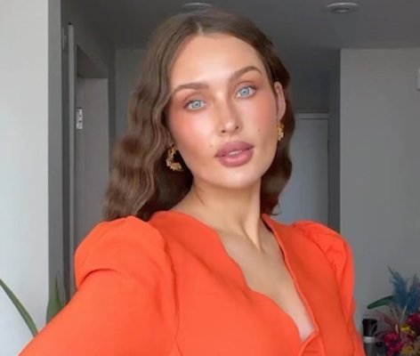 Roz Purcell in Bathing Suit Has a “Sunrise Dip”