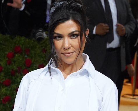 Kourtney Kardashian in Bathing Suit Celebrates Her “PE Teacher for Life”