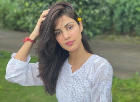 Rhea Chakraborty in Bathing Suit Says “Orange is the New Black”