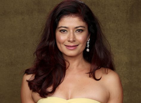 Pooja Batra in Bathing Suit is “Swimming With the Turtles”