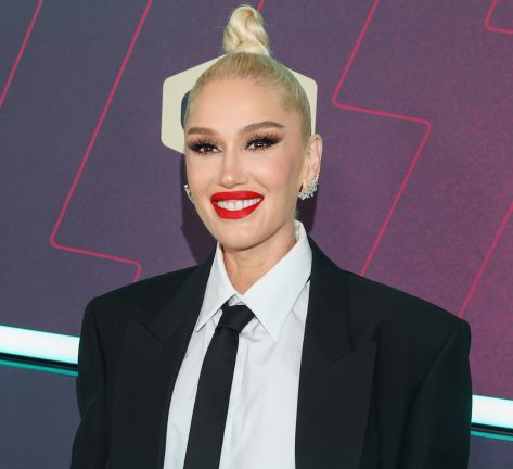 Gwen Stefani in Bathing Suit Says “Cheers”