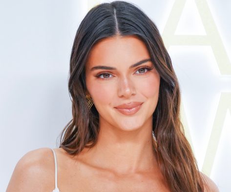 Kendall Jenner Shares Swimsuit Photo Touting "Peanuts and Beer"