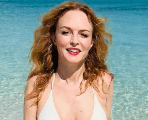 Heather Graham Shares Swimsuit Photo for “Hot Tomato Girl Summer”