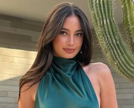 SI Swimsuit Model Kelsey Merritt Shares Swimsuit Photo “Out of Reach”