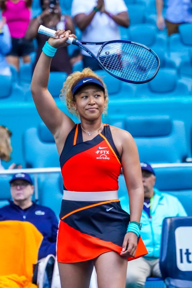 MIAMI GARDENS, FLORIDA - MARCH 31, 2022: Grand Slam Champion Naomi Osaka of Japan celebrates victory after her semifinal match at 2022 Miami Open at the Hard Rock Stadium in Miami Gardens, Florida